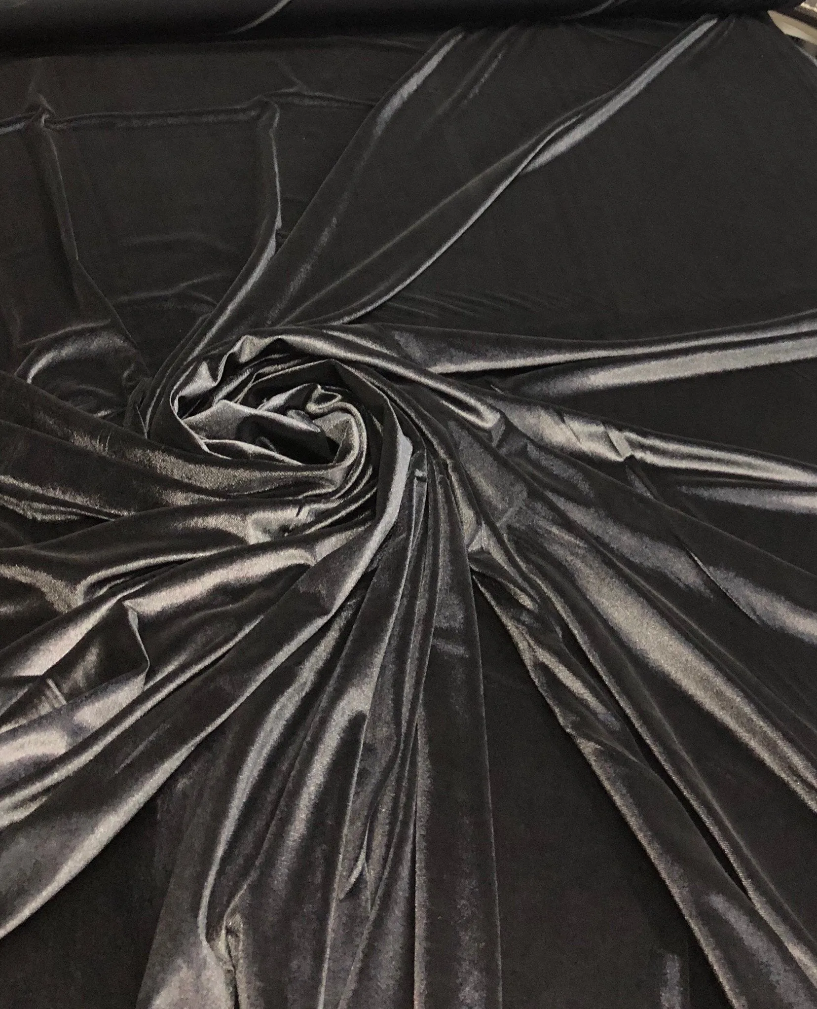 Stretch velvet 60&quot; wide     Beautiful jet black color    Fabric sold by the yard